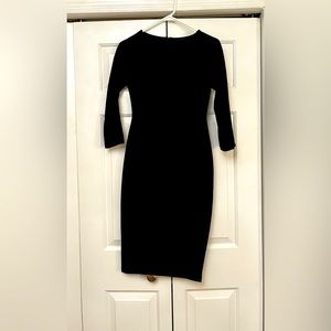 Zara black dress to the knee. Size small. Form fitting.